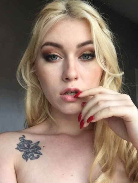 Beautiful blonde slut Misha Cross takes a selfie fully clothed and stark natural