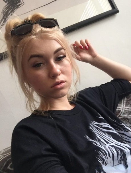 Beautiful blonde slut Misha Cross takes a selfie fully clothed and stark natural