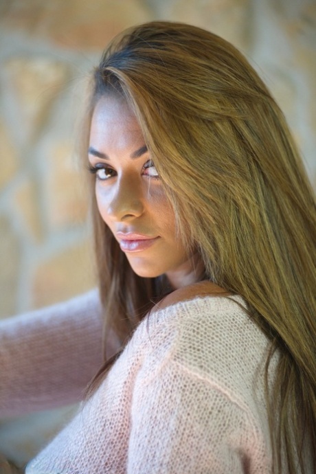 Busty authentic Rebecca Kelly undoes her sweater for selfies in socks