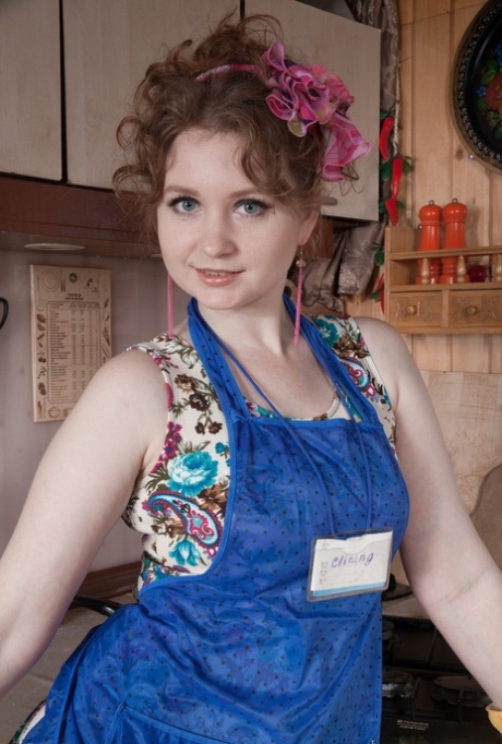 Thick solo model Bazhena undresses in her kitchen to show her beaver