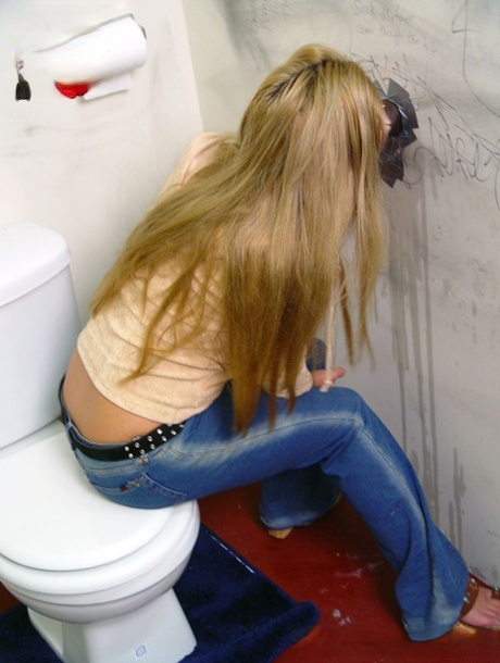 Insatiable cougar Friday throating big dark meat pole at a gloryhole