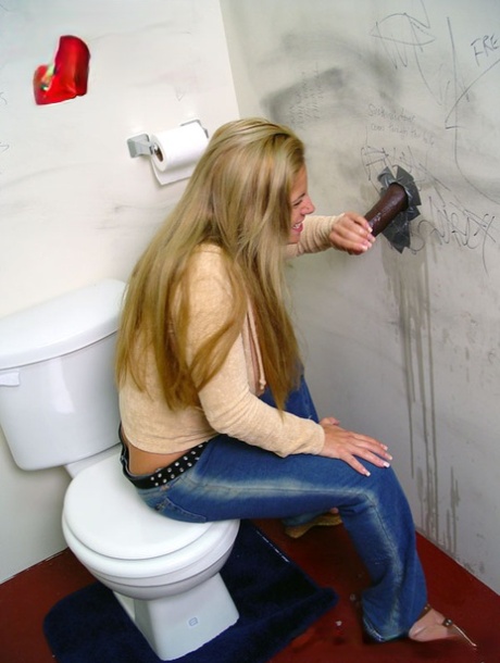 Insatiable cougar Friday throating big dark meat pole at a gloryhole