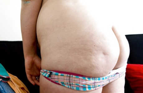 Buxom authentic Laurice removes clothing to display her BBW figure