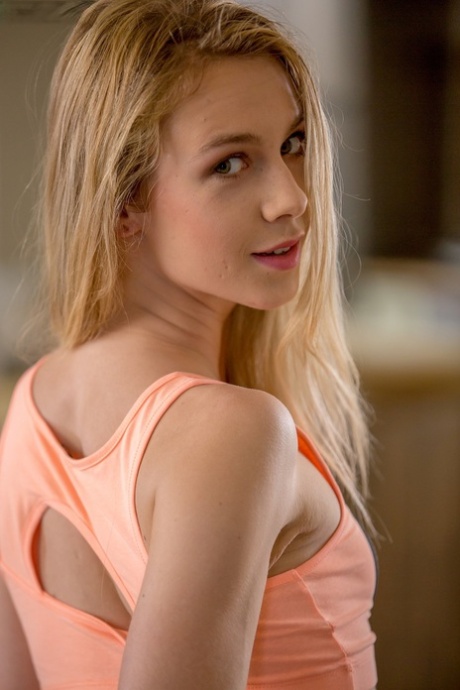 Skinny young adult Alecia Fox rubs her trimmed femininity after stripping natural