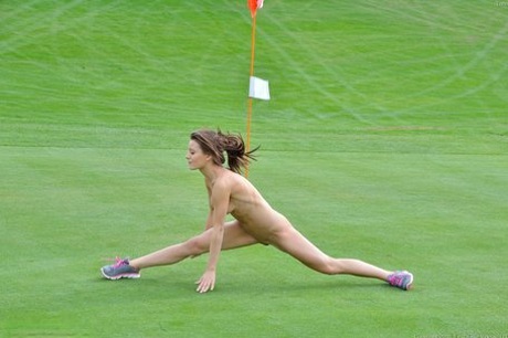 Petite blue-eyed brunette Lana strikes alluring artistic poses outdoors