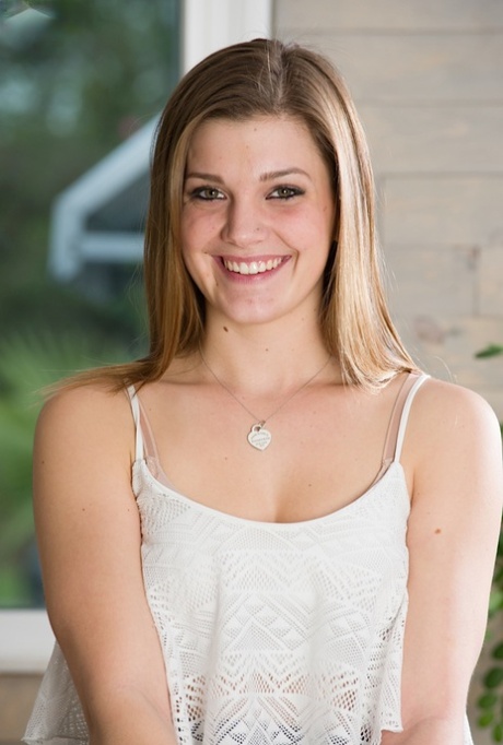 Alluring young adult girl Aubrey Snow parts her femininity lips during artistic posing debut