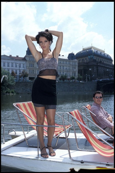 Skinny pornstar Jennifer Dark enjoys foot fetish intimacy on a couch