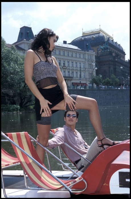 Skinny pornstar Jennifer Dark enjoys foot fetish intimacy on a couch