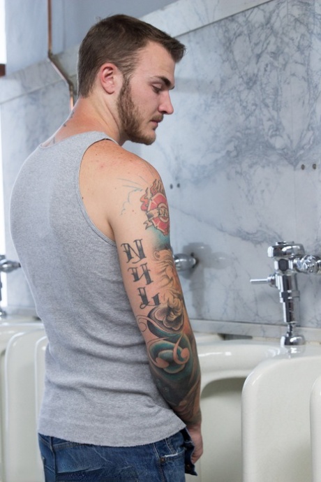 Smoking Gia DiMarco opens trench coat to sit on men's toilet in attractive lingerie