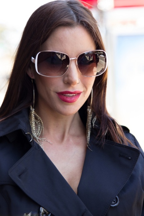 Smoking Gia DiMarco opens trench coat to sit on men's toilet in attractive lingerie