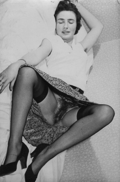 Alluring vintage pornstars spreading legs in stockings to show hairy pussies