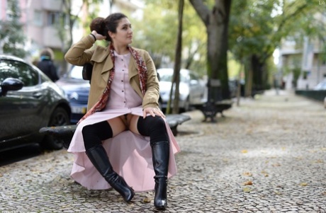 Cute authentic mom Lili flashes her muff as she poses pantyless in public