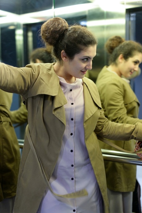 Cute authentic mom Lili flashes her muff as she poses pantyless in public