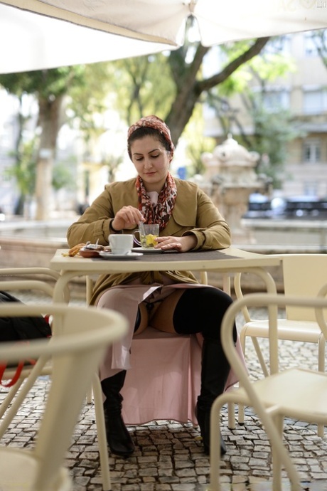 Cute authentic mom Lili flashes her muff as she poses pantyless in public