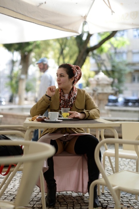 Cute authentic mom Lili flashes her muff as she poses pantyless in public