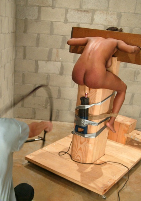 Busty ebony bondage slave Sinnamon Love gets her femininity toyed while tied up