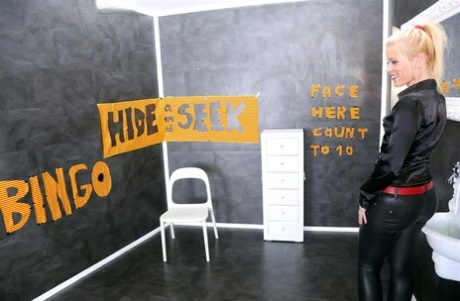 Fully clothed blonde tales off skin tight pants while getting jizz blasted