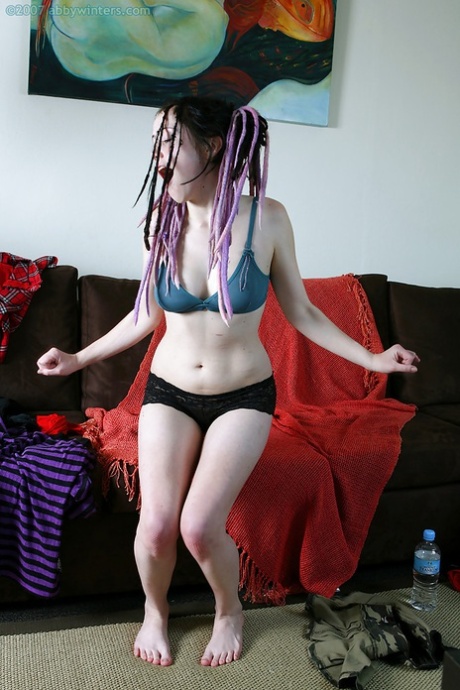 Cute dreadlock attired authentic Jade L posing in bra and underwear