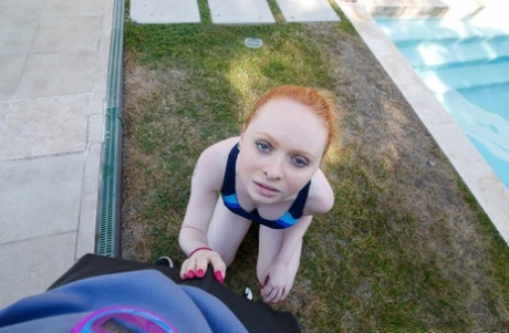 Pale ginger head Ruby Red gives attractive poolside oral pleasure & enjoys POV femininity passionate