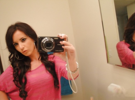 Barely legal young adult Mia Valentine taking natural mirror selfies while undressing