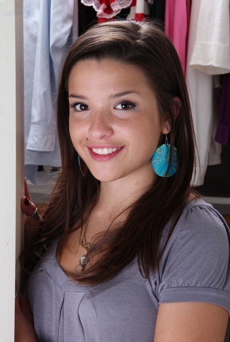 Sweet teenage authentic undressing and spreading her legs in changing room