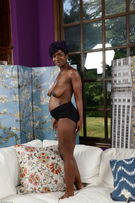 Pregnant black lady Tiana Grey spreads her femininity and curves in the artistic