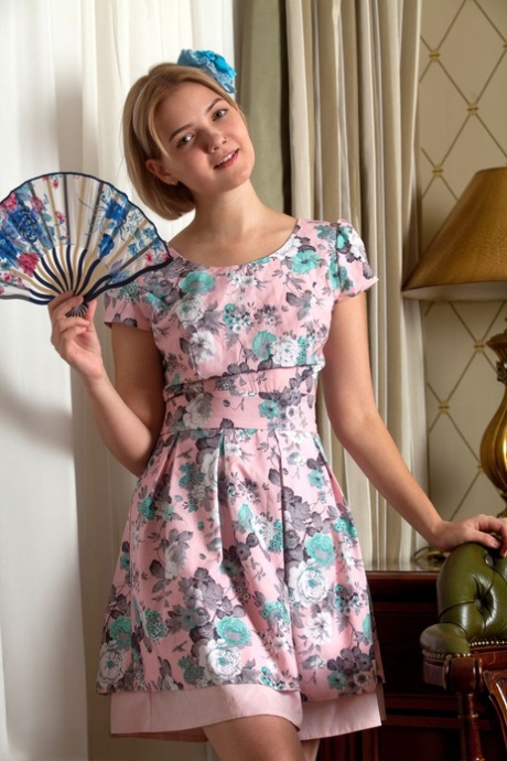 Attractive young Sandra doffs sun dress to expose her young shaved femininity and attractive curves