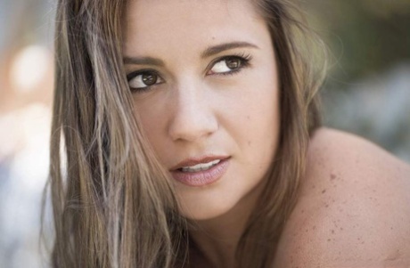 Nerdy solo model Victoria James takes off her clothes for alluring artistic poses