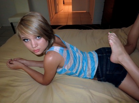 Blonde young adult babe Dakota Skye takes series of alluring selfies to get you hard