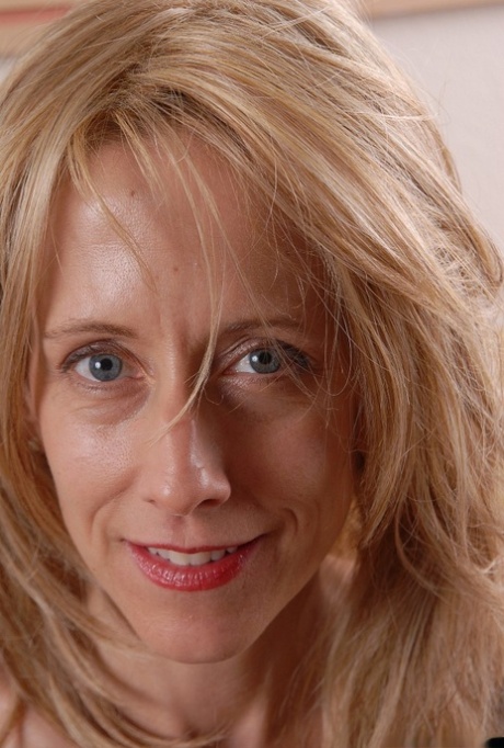 Big-tit mature Charlotte shows her pretty young-looking boobies