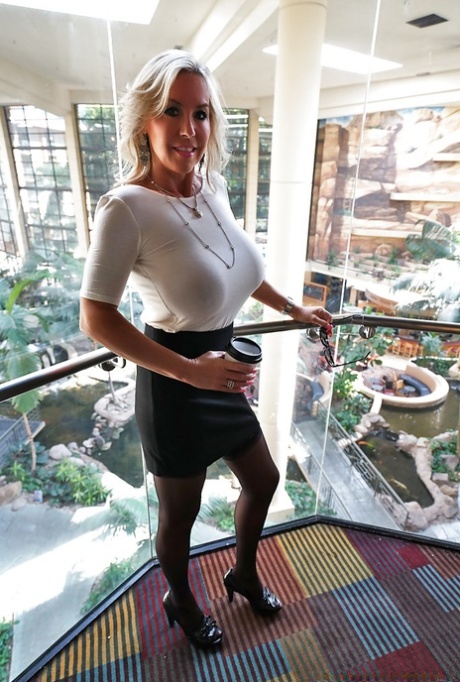 Older blonde housewife Sandra Otterson freeing massive babe type breasts