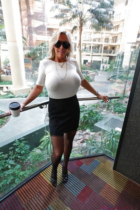 Older blonde housewife Sandra Otterson freeing massive babe type breasts