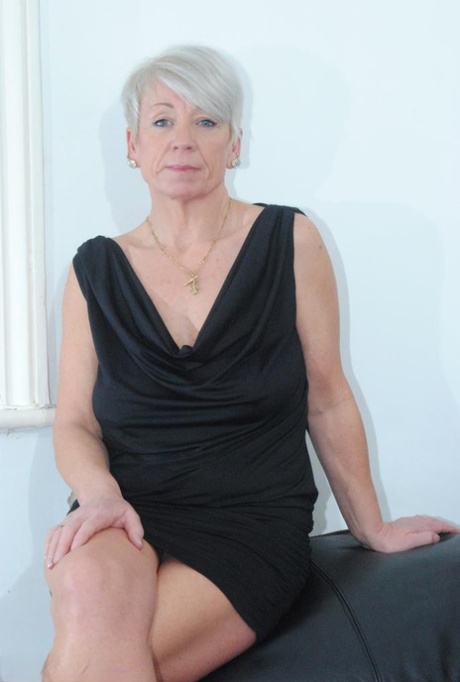 Sophisticated mature lady in black dress Shazzy B reveals alluring breasts & coochie