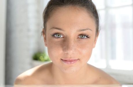 Sweet young Medina U kneel on a chair natural and flaunts her petite alluring curves