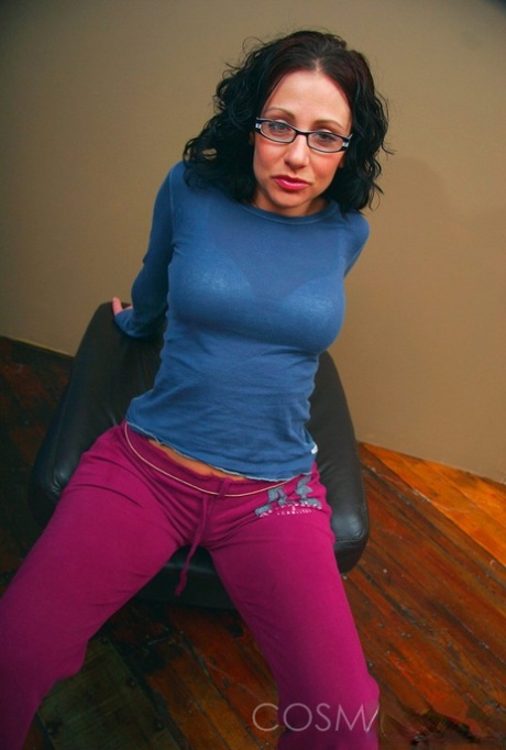 Attractive mature Jordana leaves glasses on & takes clothes off to show her big breasts