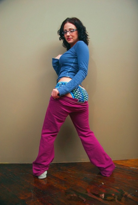 Attractive mature Jordana leaves glasses on & takes clothes off to show her big breasts