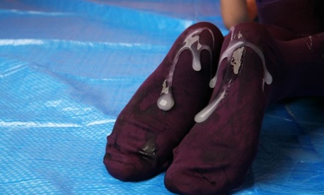 Japanese girl with nice breasts and a trimmed bush is covered in sperm