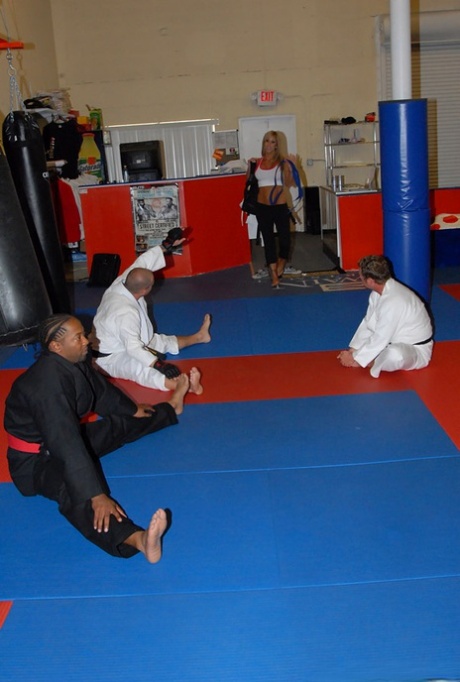 Martial arts workout ends up with intimacy with famous busty mature woman