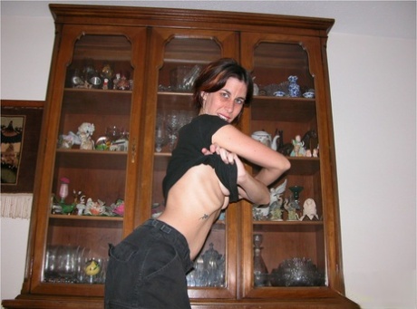 Skinny older lady with an ugly face parts her femininity lips while getting natural