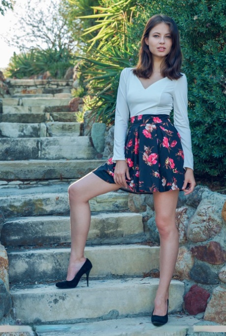 Cute solo girl Hilary C takes off her up skirt panties to pose in the artistic