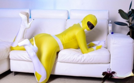 Solo model Yuffie Yulan removes her Power Ranger outfit before masturbating