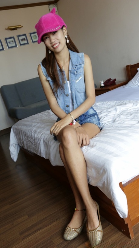 Asian babe Nam C shows off her petite body while stripping for some POV intimacy