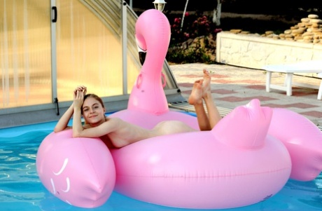 Lovely young adult Shayla shows every inch of her petite natural body outdoors