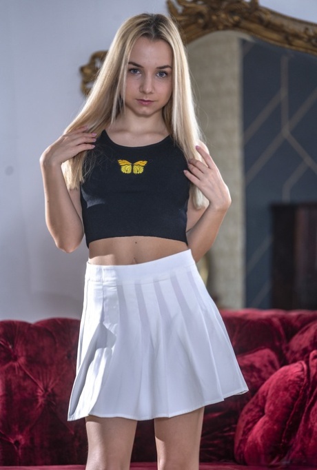 Petite pornstar Mona Blue exposes her slim figure and gets fucked hard