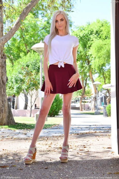 Platinum blonde Joslyn strips to her lingerie & flashes her femininity in public