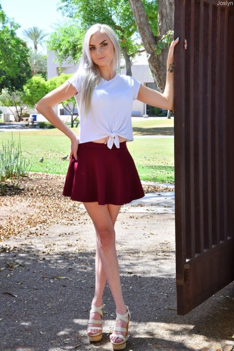 Platinum blonde Joslyn strips to her lingerie & flashes her femininity in public