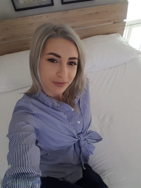 Attractive young adult with a small bosom Ari Fox undresses and poses artistic at her home