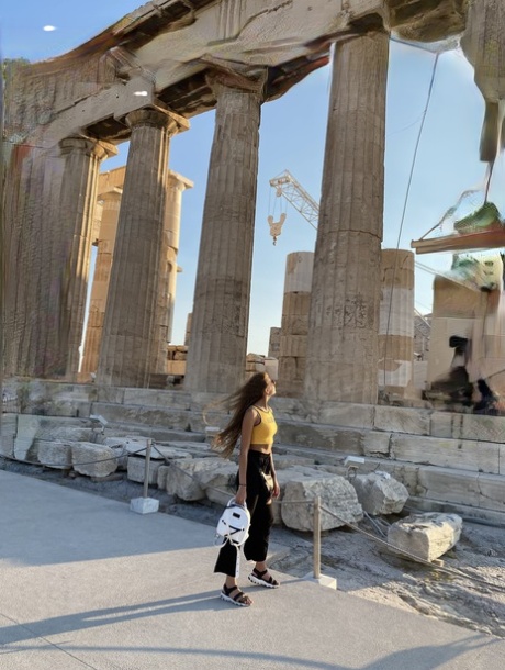 Skinny babe takes artistic selfies showing her tiny breasts and her tight curves