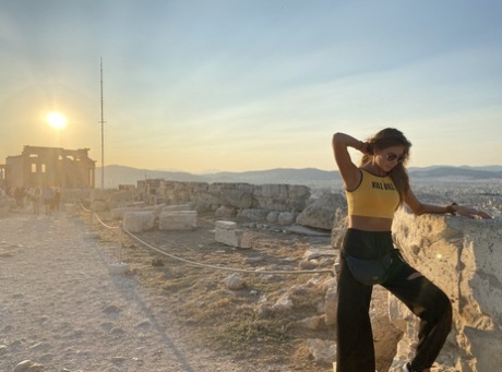 Skinny babe takes artistic selfies showing her tiny breasts and her tight curves