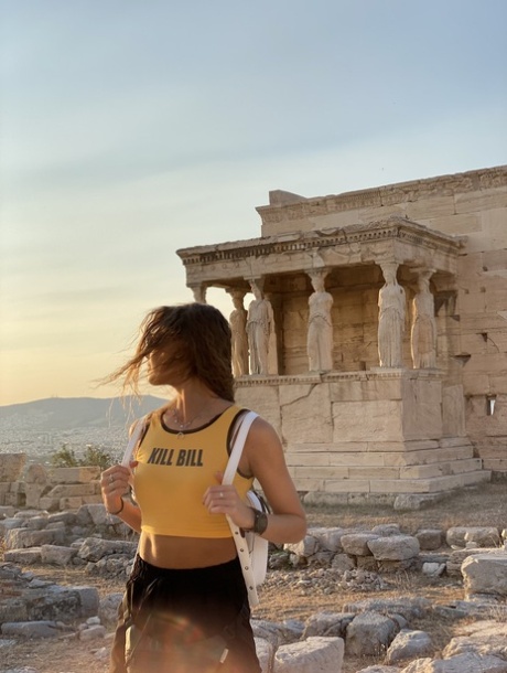 Skinny babe takes artistic selfies showing her tiny breasts and her tight curves